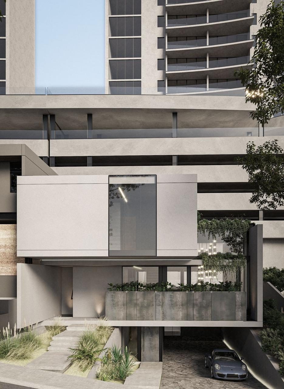 Concrete House, fachada de concreto con acceso vehicular en contexto vertical